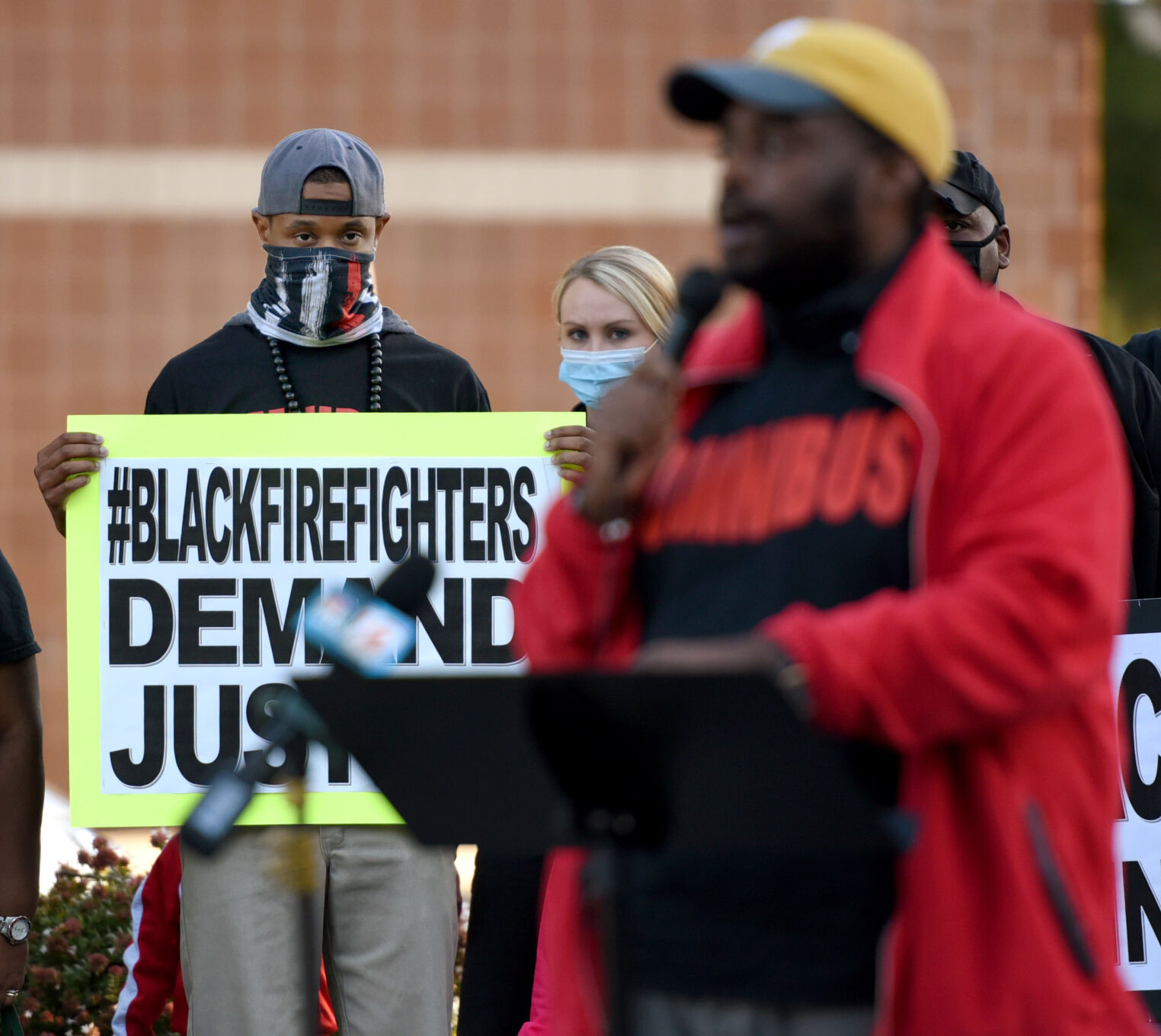 Omnibus black firefighter press conference